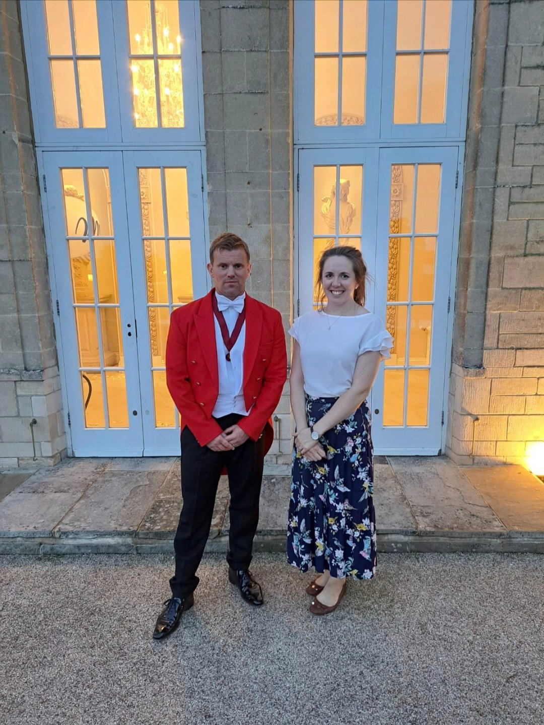 Ross toastmaster in red coat outside prestigious South East England venue