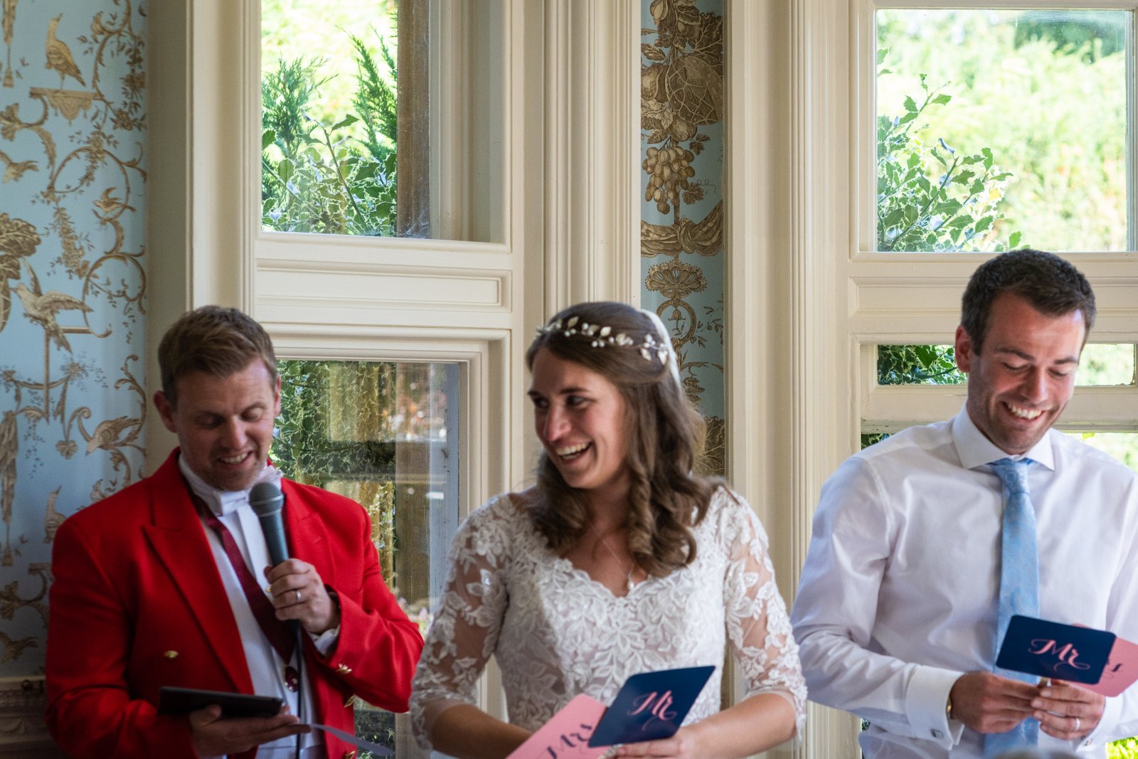 Ross toastmaster with bride and groom at wedding